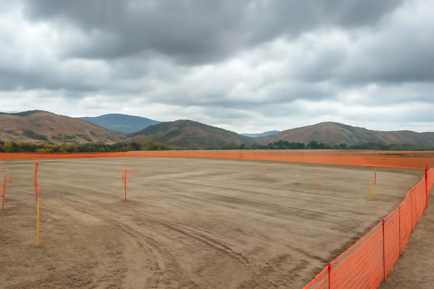 Graded construction lot with utility stakes